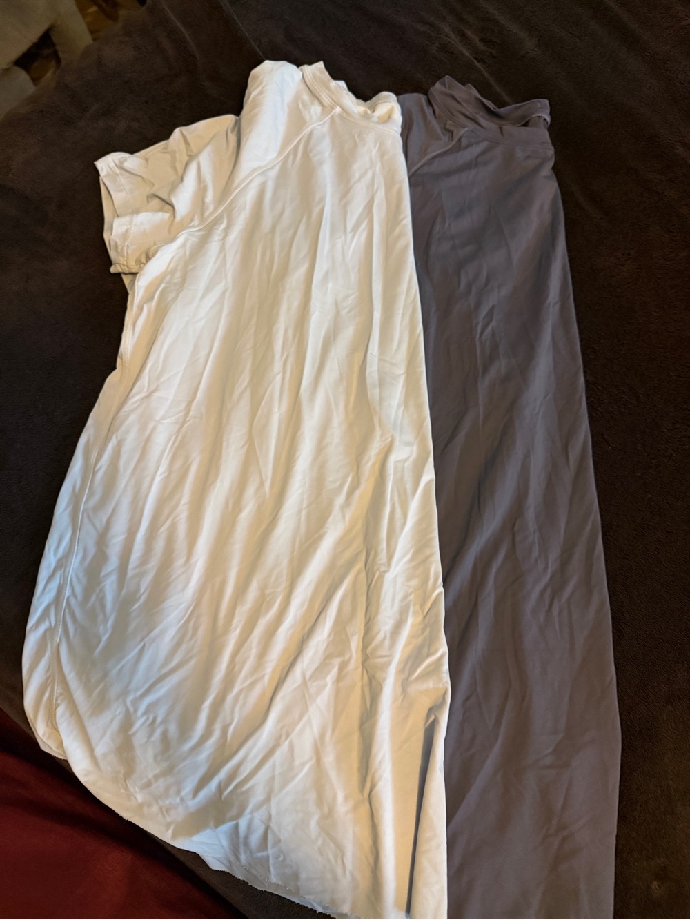 Work out shirts, smooth, lightweight fabric. Cute open back